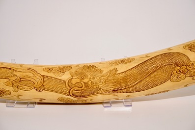 A large Chinese carved ivory tusk, early 20th C.