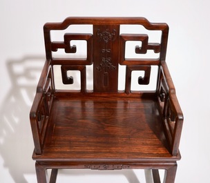 A pair of Chinese carved hardwood chairs, 19th C.