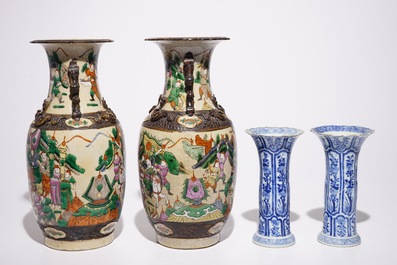 A pair of Chinese blue and white Kangxi vases and a pair of famille rose Nanking vases, 19th C.