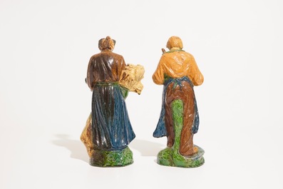 Deux figures en poterie flamande de la s&eacute;rie &quot;Les 4 saisons&quot;, prob. ateliers de Laigneil, 20&egrave;me