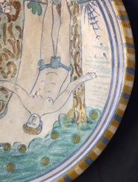 A polychrome Dutch maiolica plate with Adam and Eve, ca. 1600