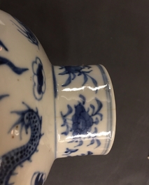 A five-piece Chinese blue and white garniture with dragons, 19th C.