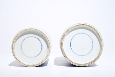 A near pair of Chinese blue and white rouleau vases with dragon panels, Kangxi