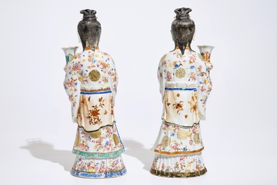 Two large Chinese famille rose candle holders modelled as court ladies, Qianlong