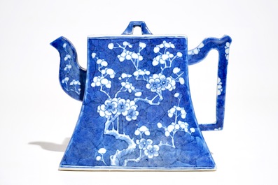 A Chinese blue and white &quot;prunus and ice&quot; teapot and cover, Kangxi mark, 19th C.