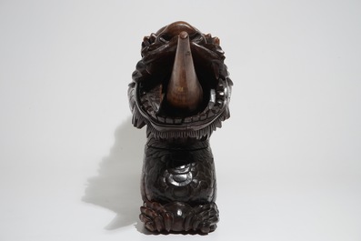 A Chinese carved wood figure of a two-headed dragon, 19/20th C.