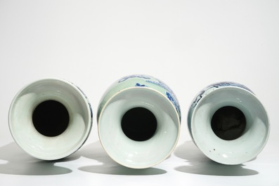 Three tall Chinese blue and white on celadon-ground vases, 19th C.