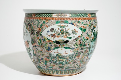 A Chinese famille verte fish bowl with a qilin and a phoenix, 19th C.
