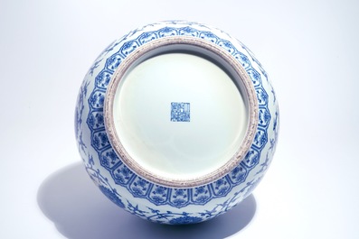 A Chinese blue and white lotus scroll hu vase, Qianlong mark, 20th C.