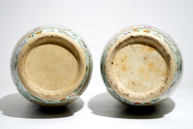 A pair of fine tall Chinese Canton famille rose vases, 19th C.