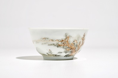 A Chinese grisaille and gilt cup and saucer with a fine landscape, Yongzheng