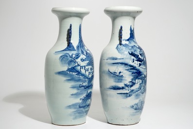 Two tall Chinese blue and white landscape vases, 19/20th C.