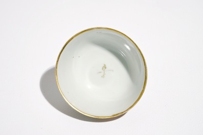 A Chinese famille rose mandarin cup and saucer, Qianlong