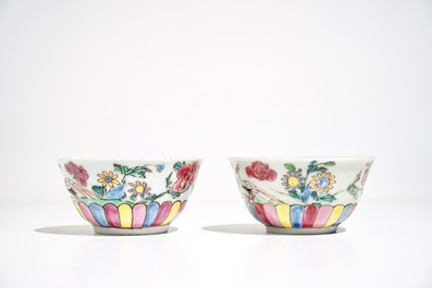 A pair of Chinese famille rose cups and saucers, Yongzheng/Qianlong