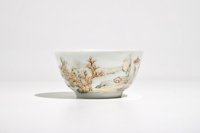 A Chinese grisaille and gilt cup and saucer with a fine landscape, Yongzheng