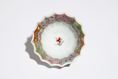 A Chinese lobed famille rose cup and saucer, Yongzheng