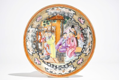 A Chinese famille rose mandarin cup and saucer, Qianlong