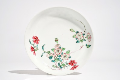 A Chinese famille rose cup and saucer, Yongzheng