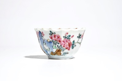 A Chinese lobed famille rose cup and saucer, Yongzheng