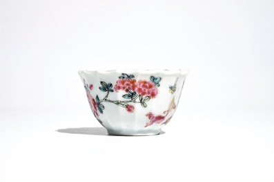 A Chinese lobed famille rose cup and saucer, Yongzheng