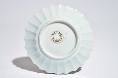 A Chinese lobed famille rose cup and saucer, Yongzheng