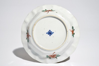 A Chinese famille verte cup and saucer with egrets, Kangxi