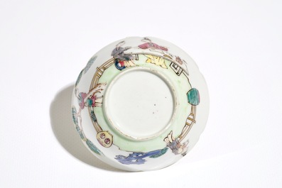 A Chinese famille rose mandarin cup and saucer, Qianlong