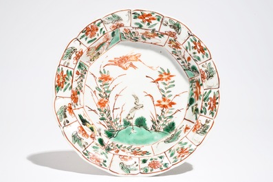 A Chinese famille verte cup and saucer with egrets, Kangxi