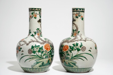 A pair of Chinese famille verte bottle vases, 19th C.