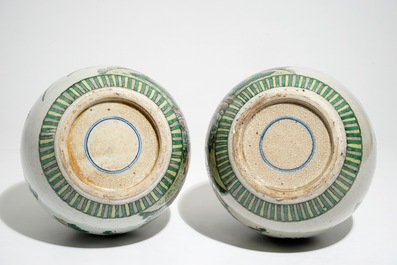 A pair of Chinese famille verte bottle vases, 19th C.