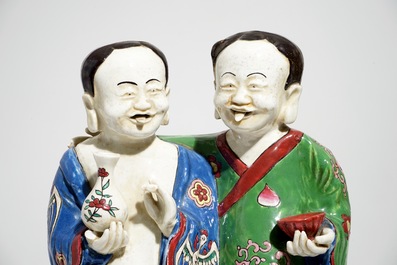 Two tall Chinese famille rose groups of the Hehe Er Xian brothers, 19/20th C.