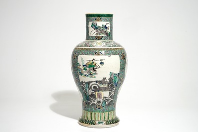 A Chinese verte enamel on biscuit vase with a fluvial landscape, Kangxi