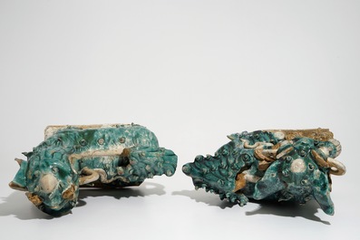 Two Chinese turquoise-glazed roof tiles shaped as temple lions, 17/18th C.