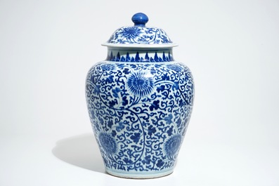 A tall Chinese blue and white baluster jar and cover with lotus scrolls, Kangxi