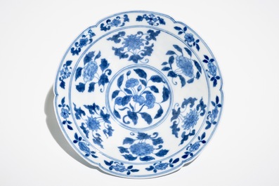 A Chinese blue and white bowl with flowers and fruits, 19th C.