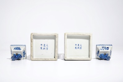 A pair of square Chinese blue and white vases and covers, Kangxi mark, 19th C.