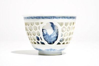 A Chinese double-walled blue and white cup with a tea-drinking scene, Kangxi