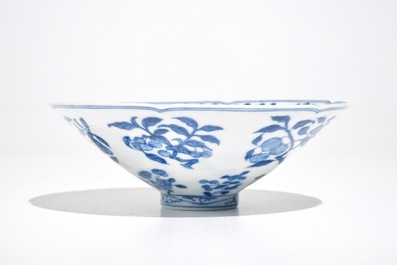 A Chinese blue and white bowl with flowers and fruits, 19th C.