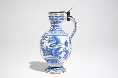 A blue and white chinoiserie jug with pewter lid, Haarlem or Delft, 1st half 17th C.