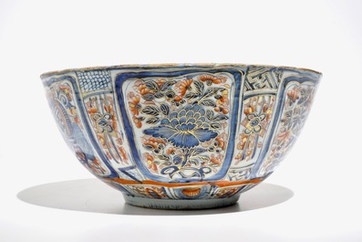 A Chinese clobbered blue and white kraak porcelain bowl with floral design, Wanli