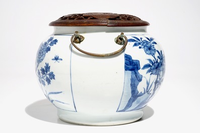 A Chinese blue and white bowl with wooden cover and bronze handles, Kangxi