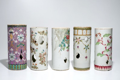 Five Chinese famille rose and qianjiang cai hat stands, 19/20th C.