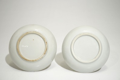 A pair of Chinese armorial cups and saucers for the French market, Qianlong