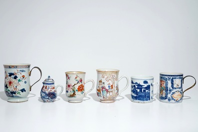 Five Chinese famille rose and blue and white mugs and a covered jug, mostly Qianlong