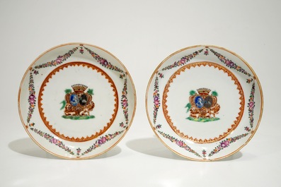 A pair of Chinese armorial cups and saucers for the French market, Qianlong
