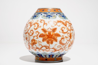 A Chinese doucai and iron-red flower scroll vase, Qianlong mark, 20th C.