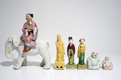 Six various Chinese famille rose and sancai-glazed figures, incl. a girl on an elephant, 19/20th C.