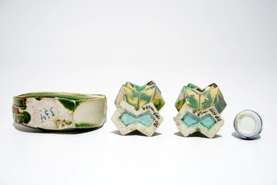 A pair of spinach and egg lozenge-shaped vases, a verte biscuit model of a boat and a miniature vase, Kangxi