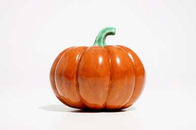 A Chinese coral-glazed model of a pumpkin, 19/20th C.