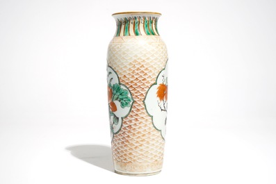 A Chinese wucai rouleau vase with floral medallions, Transitional period